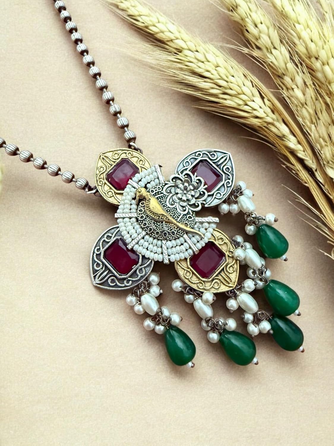 Peacock Elegance Oxidized Necklace Set with Ruby and Emerald Accents
