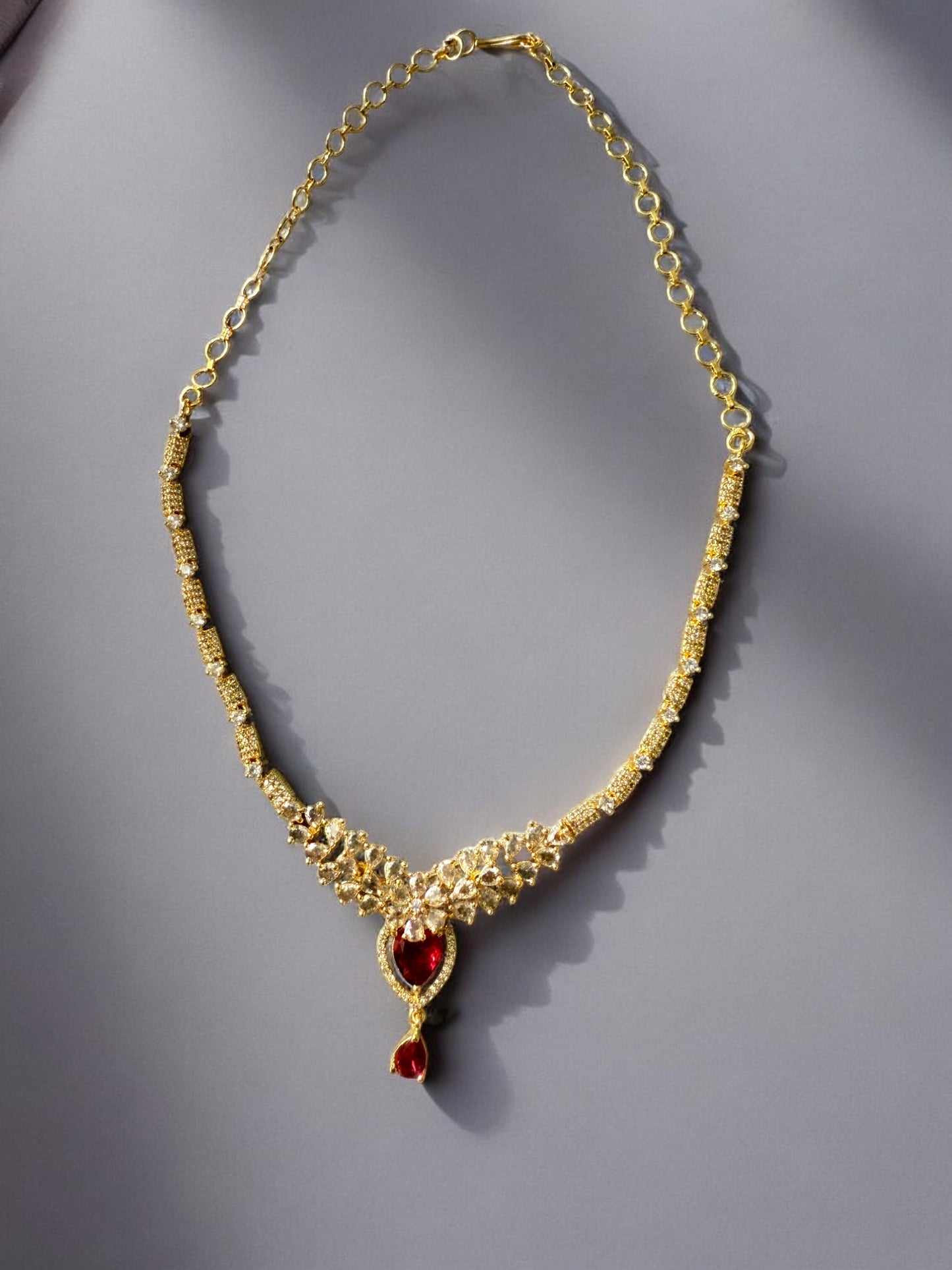 Gold Plated Stone-Studded Necklace Set with Matching Earrings
