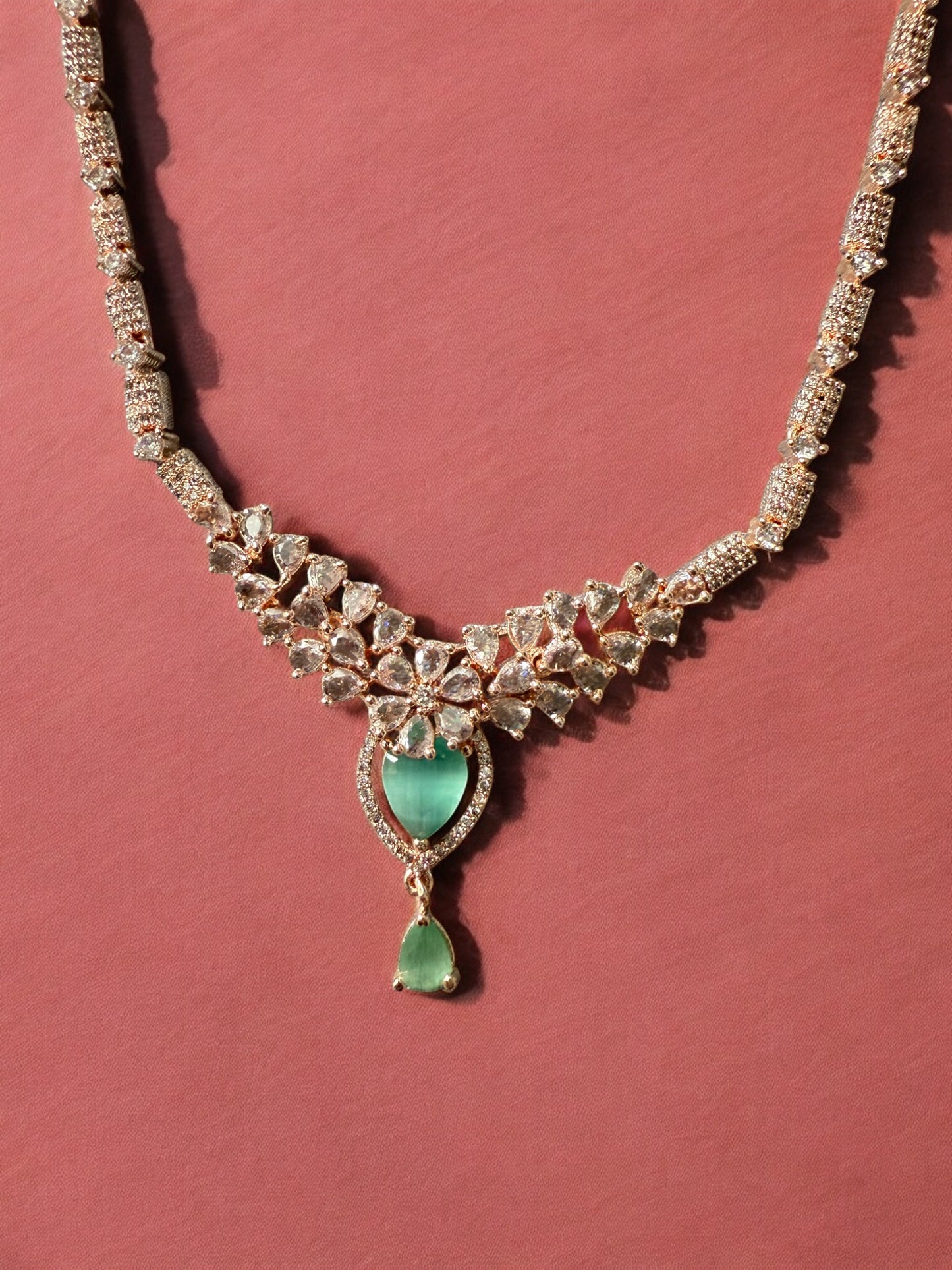 Gold Plated Mint Stone-Studded Necklace Set with Matching Earrings