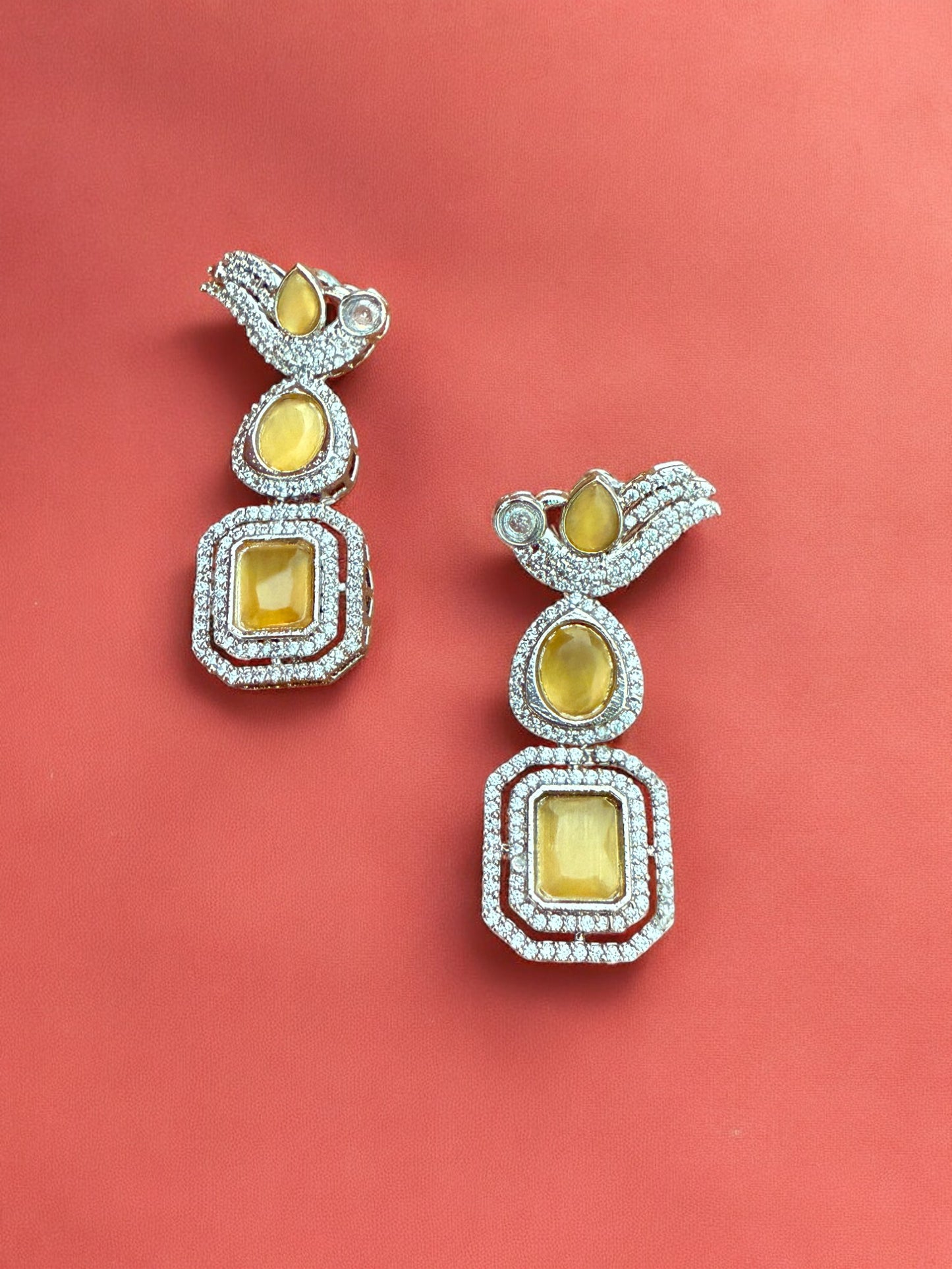 Silver Toned Cubic Zircon Earrings With Yellow Stones And Delicate Bird Motif Detailing