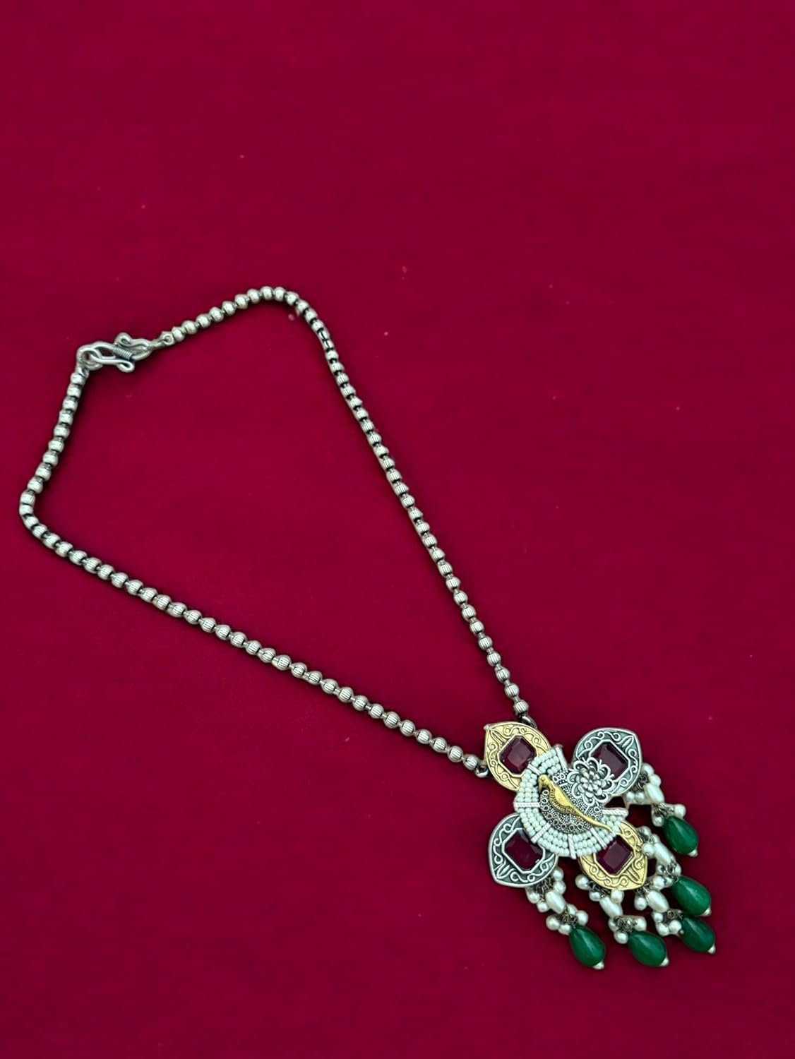 Peacock Elegance Oxidized Necklace Set with Ruby and Emerald Accents