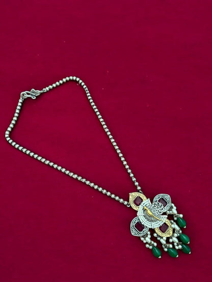 Peacock Elegance Oxidized Necklace Set with Ruby and Emerald Accents