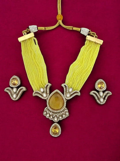 Rebekah Yellow beaded multistrand kundan necklace set with studded earrings