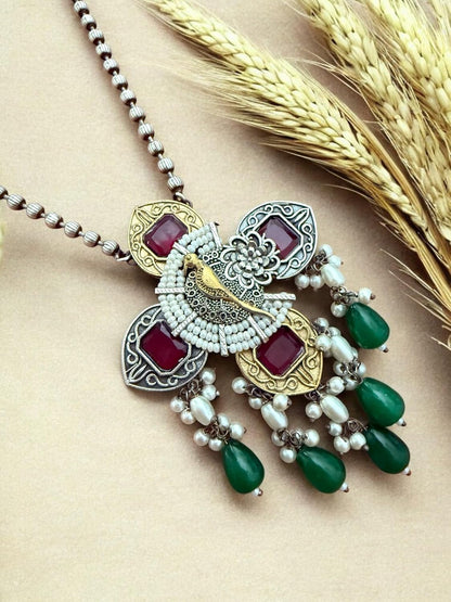 Peacock Elegance Oxidized Necklace Set with Ruby and Emerald Accents