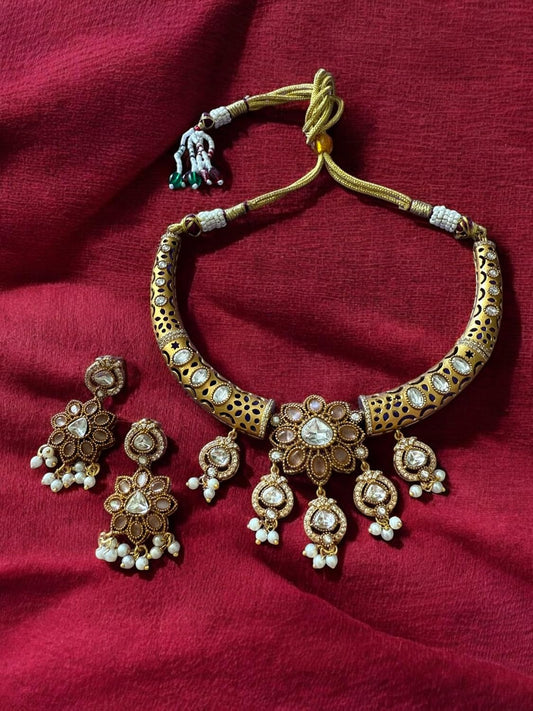 Rebekah Royal Radiance Antique Kundan Cutout Hasli Necklace Set with Tear Drops