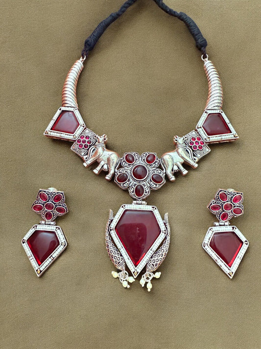 Oxidised Silver Elephant Motif Tribal Necklace Set with Maroon Stone Accent