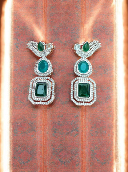 Silver Toned Cubic Zircon Earrings With Green Stones And Delicate Bird Motif Detailing