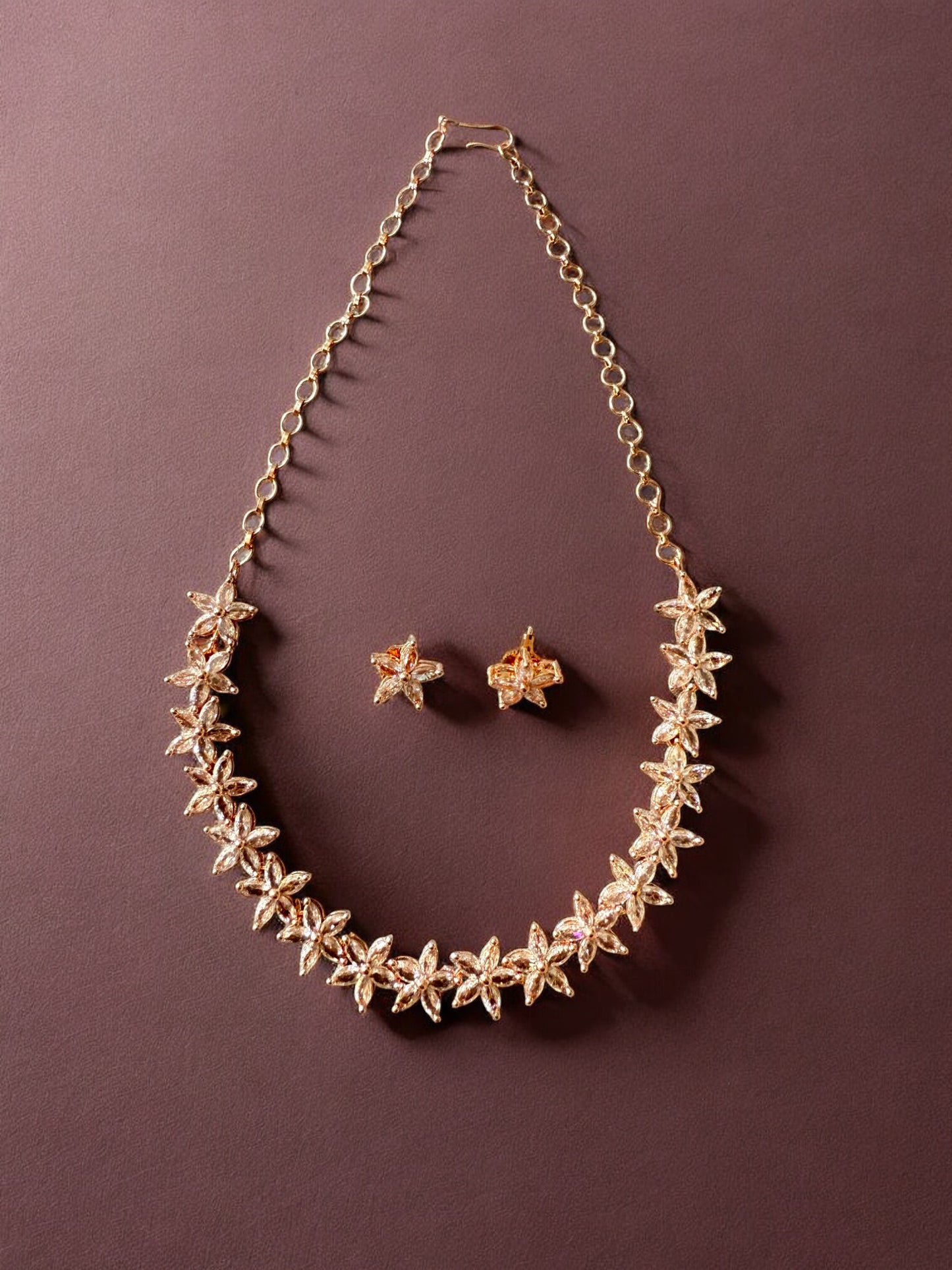 Gold-Toned Floral Necklace Set with Stone-Studded Detailing & Matching Stud Earrings – Festive Elegance Redefined