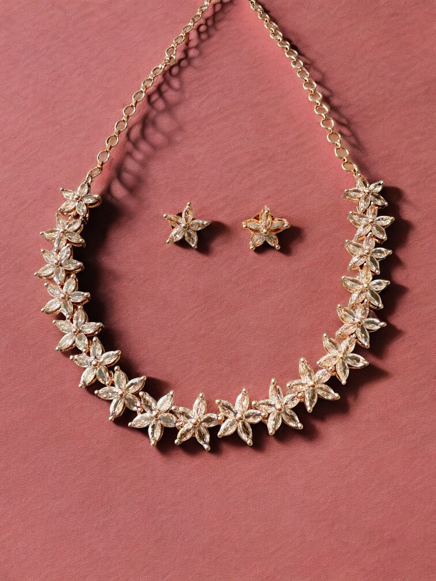 Gold-Toned Floral Necklace Set with Stone-Studded Detailing & Matching Stud Earrings – Festive Elegance Redefined
