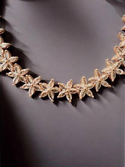 Gold-Toned Floral Necklace Set with Stone-Studded Detailing & Matching Stud Earrings – Festive Elegance Redefined