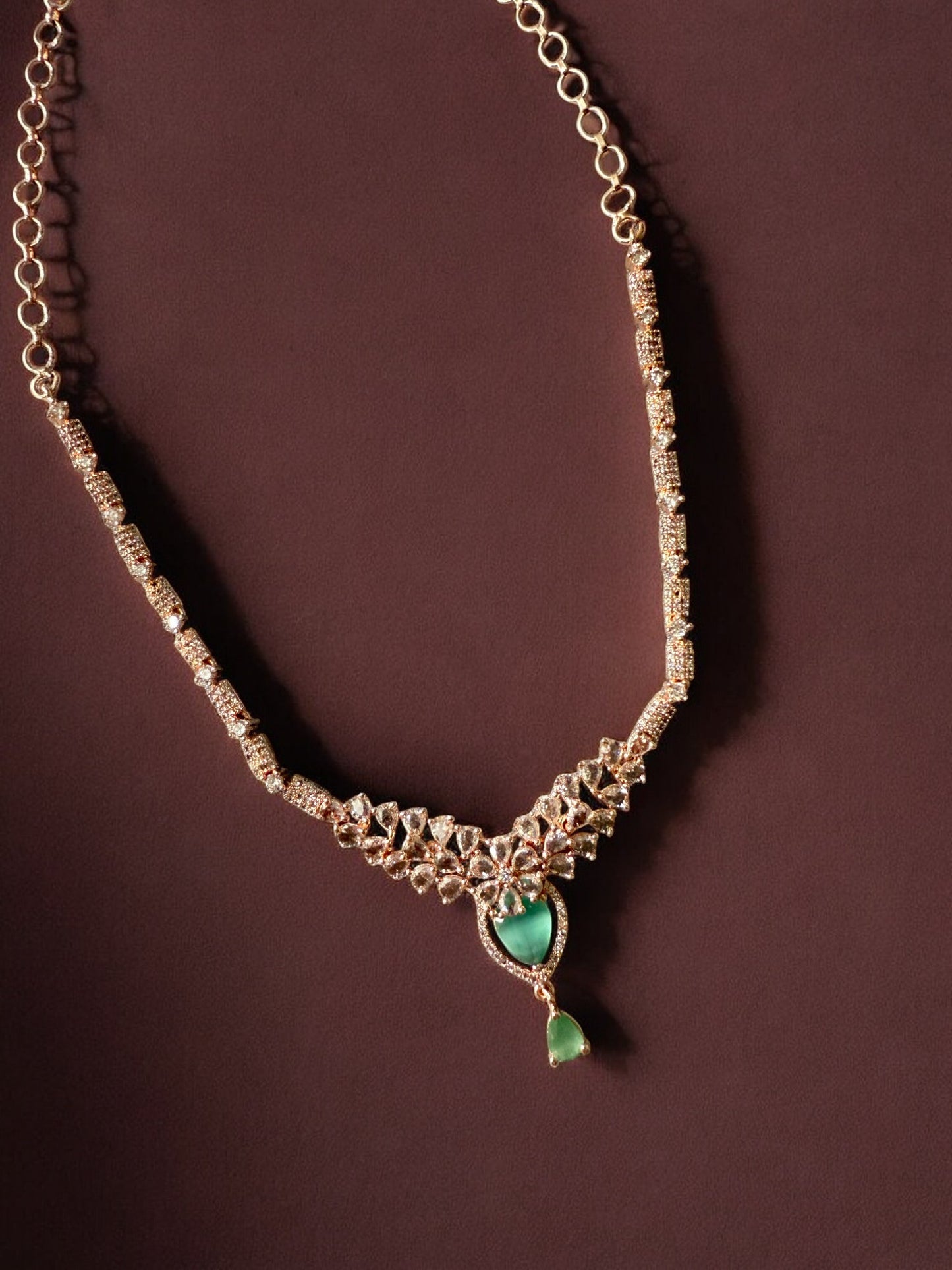Gold Plated Mint Stone-Studded Necklace Set with Matching Earrings
