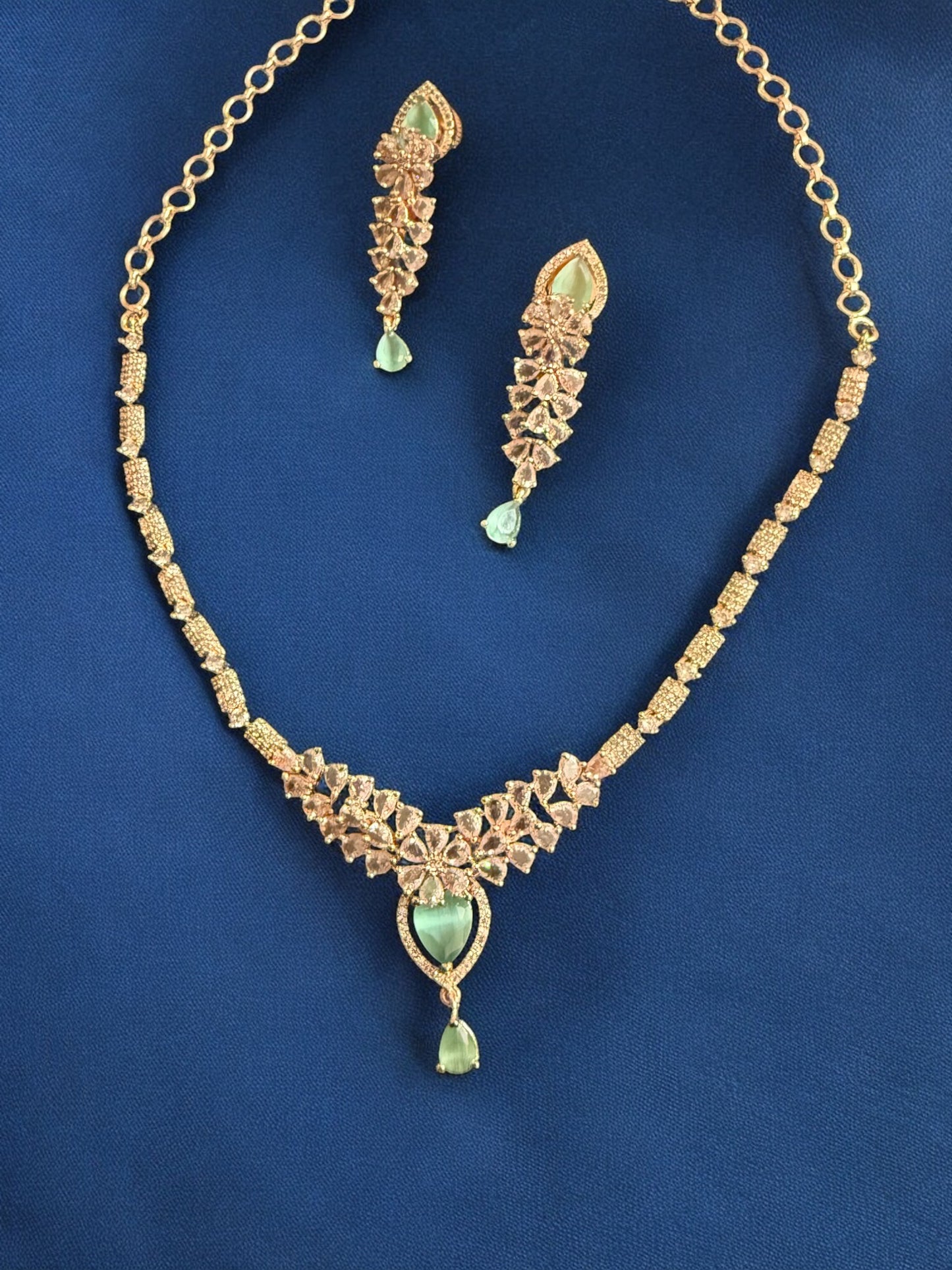 Gold Plated Mint Stone-Studded Necklace Set with Matching Earrings