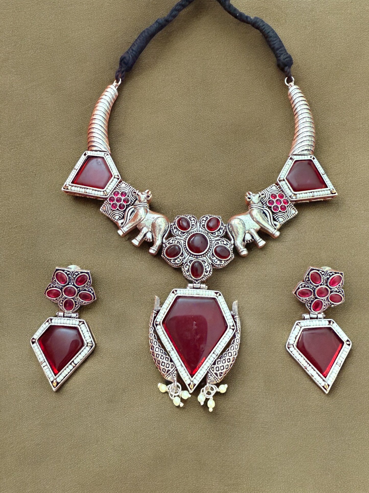 Oxidised Silver Elephant Motif Tribal Necklace Set with Maroon Stone Accent