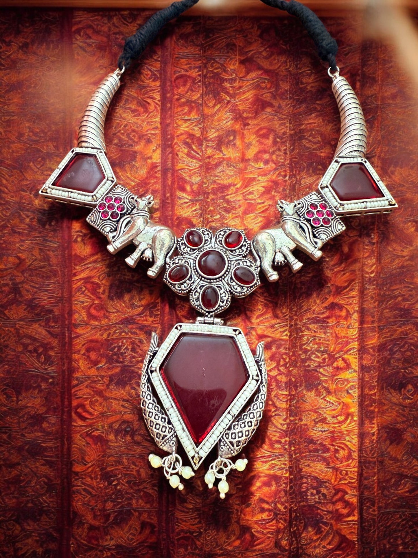 Oxidised Silver Elephant Motif Tribal Necklace Set with Maroon Stone Accent