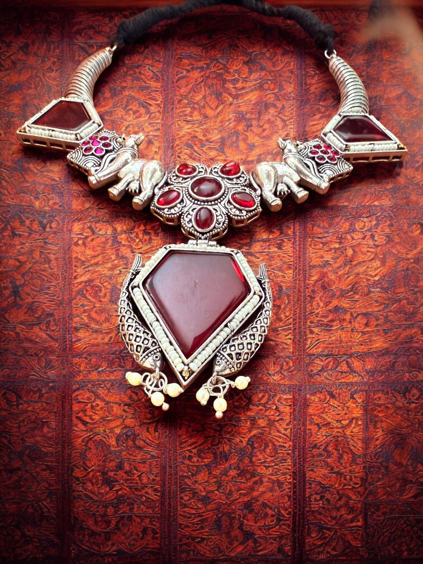 Oxidised Silver Elephant Motif Tribal Necklace Set with Maroon Stone Accent