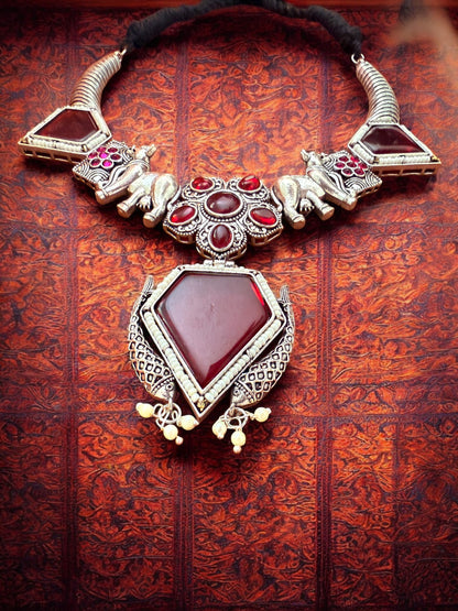 Oxidised Silver Elephant Motif Tribal Necklace Set with Maroon Stone Accent