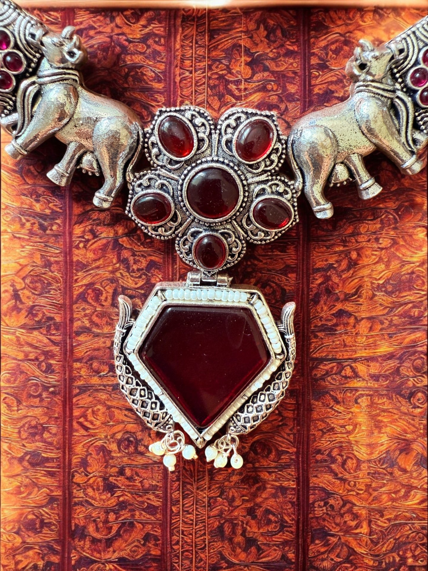 Oxidised Silver Elephant Motif Tribal Necklace Set with Maroon Stone Accent