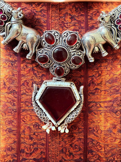 Oxidised Silver Elephant Motif Tribal Necklace Set with Maroon Stone Accent