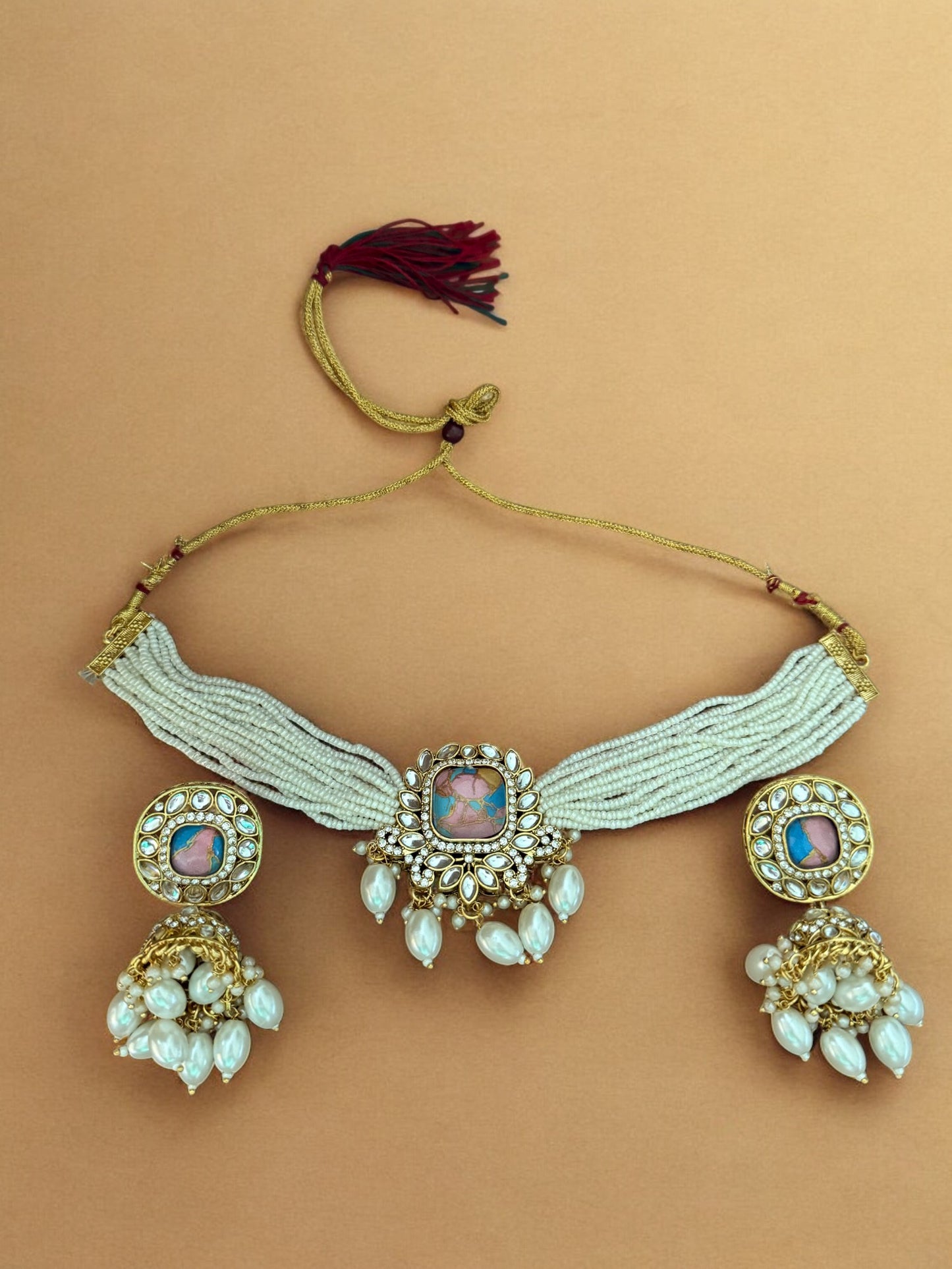 Pastel Pink Fire Stone Studded Multi Strand Pearl Kundan Choker Necklace Set with Matching Jhumkas