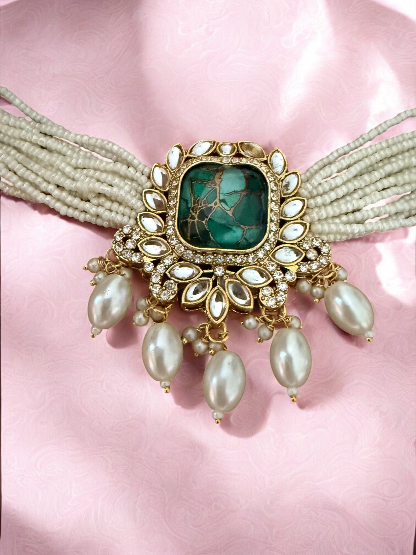 Emerald Fire Stone Studded Multi Strand Pearl Kundan Choker Necklace Set with Matching Jhumkas