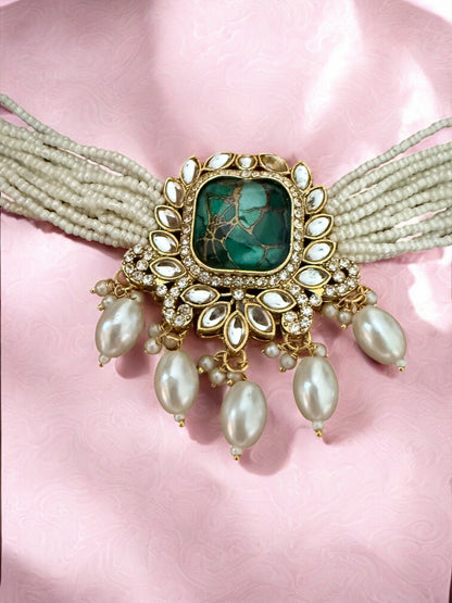 Emerald Fire Stone Studded Multi Strand Pearl Kundan Choker Necklace Set with Matching Jhumkas