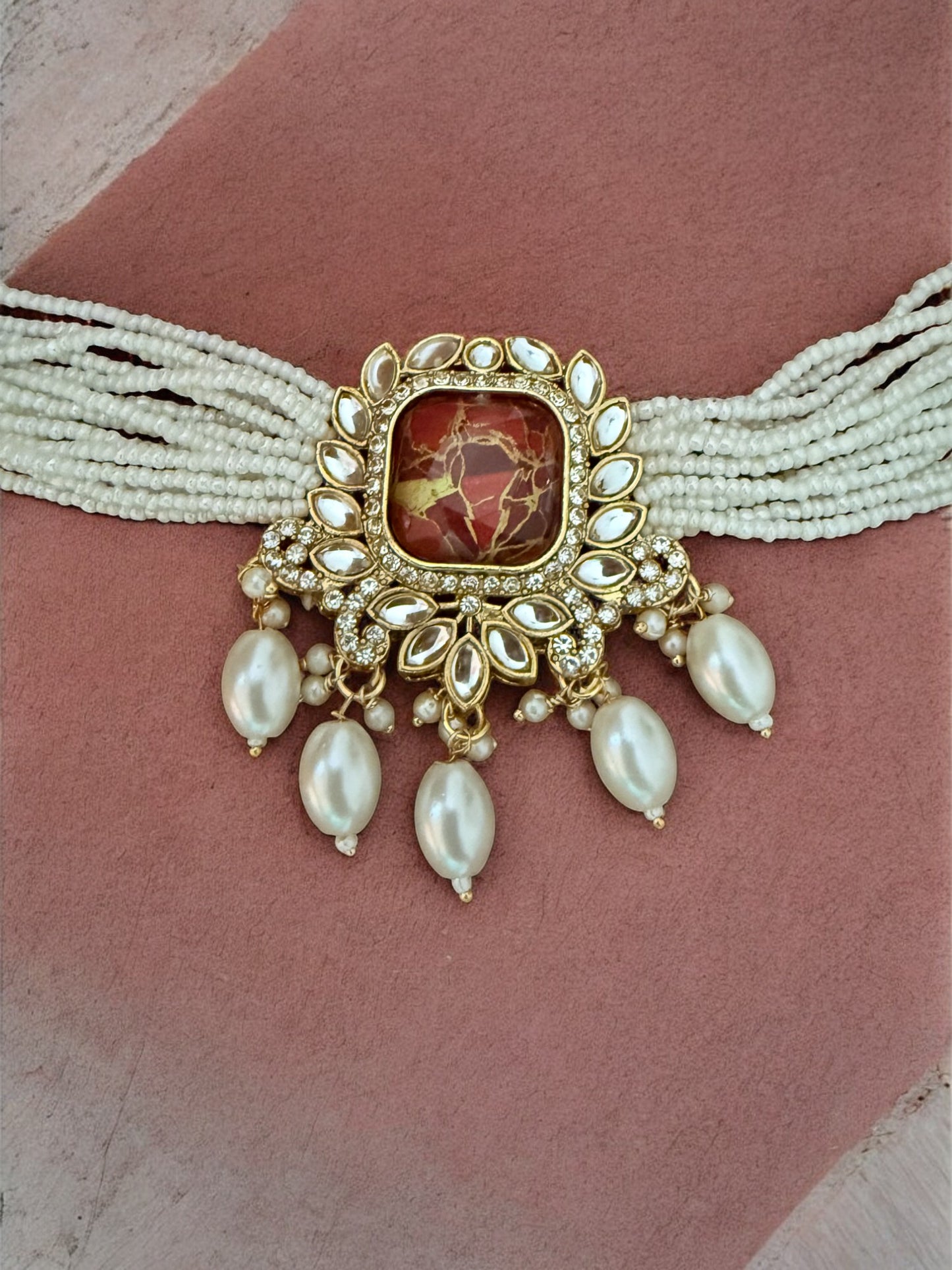 Red Fire Stone Studded Multi Strand Pearl Kundan Choker Necklace Set with Matching Jhumkas