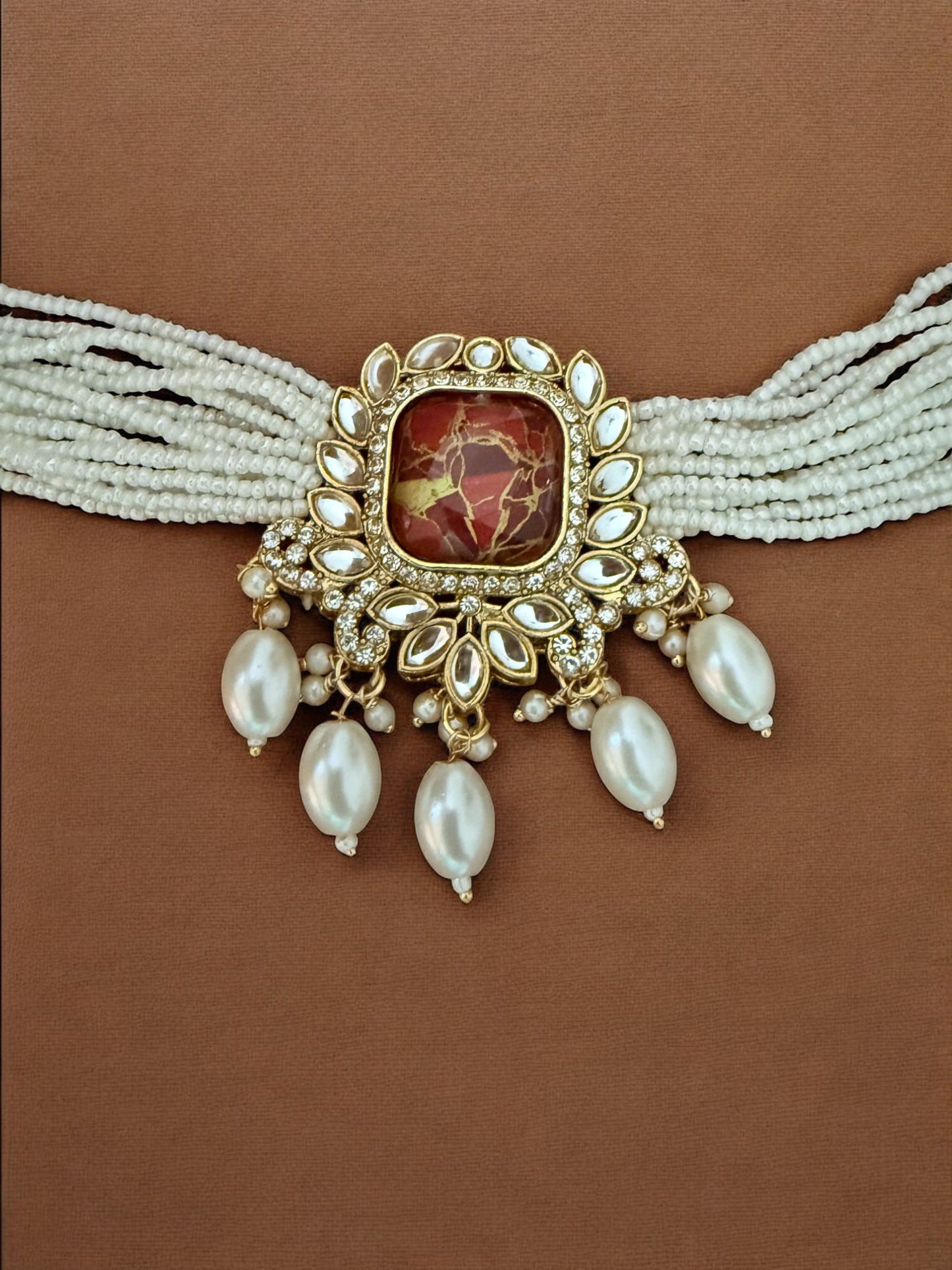 Red Fire Stone Studded Multi Strand Pearl Kundan Choker Necklace Set with Matching Jhumkas