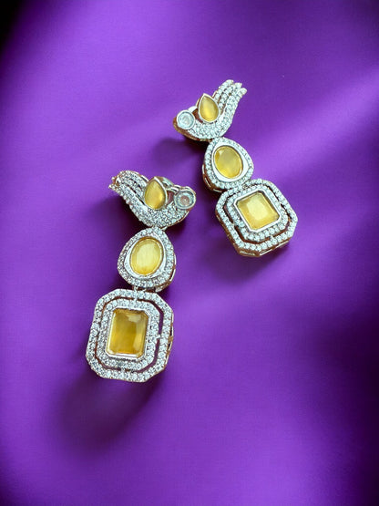 Silver Toned Cubic Zircon Earrings With Yellow Stones And Delicate Bird Motif Detailing