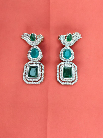 Silver Toned Cubic Zircon Earrings With Green Stones And Delicate Bird Motif Detailing