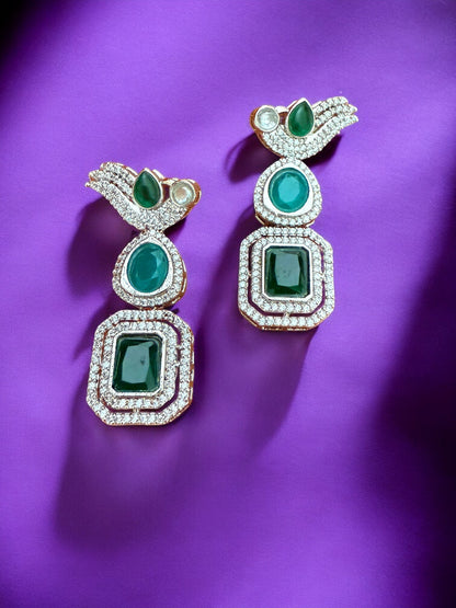 Silver Toned Cubic Zircon Earrings With Green Stones And Delicate Bird Motif Detailing