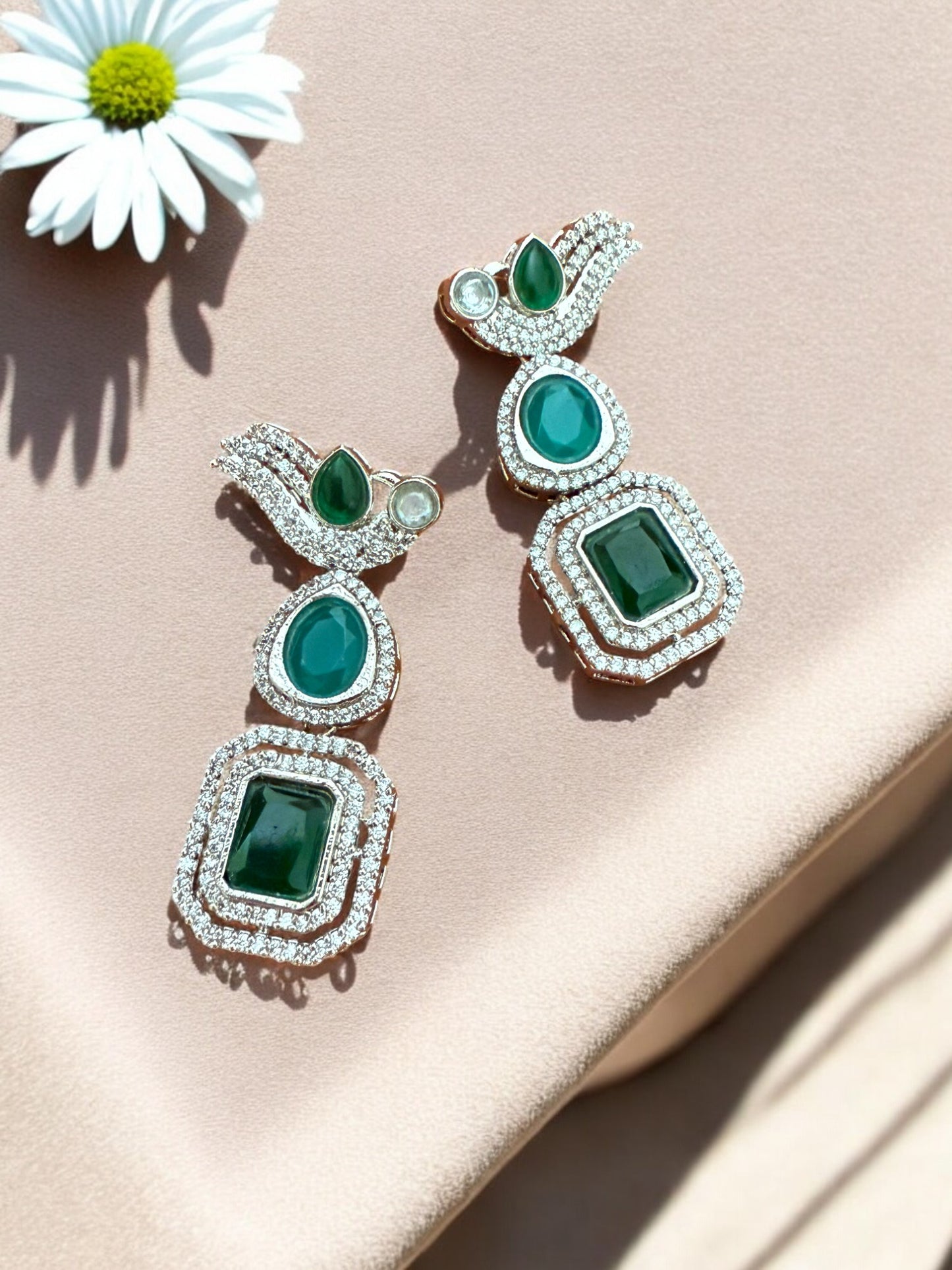 Silver Toned Cubic Zircon Earrings With Green Stones And Delicate Bird Motif Detailing
