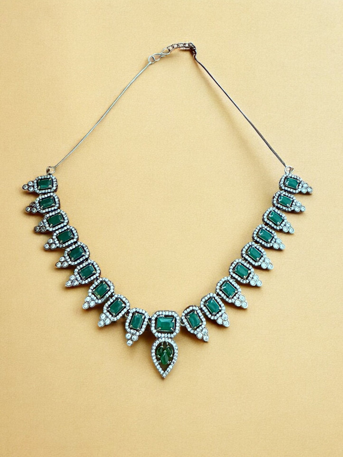Emerald Green Necklace Set with Rectangular and Teardrop Stones Accented in Silver-Tone American Diamonds