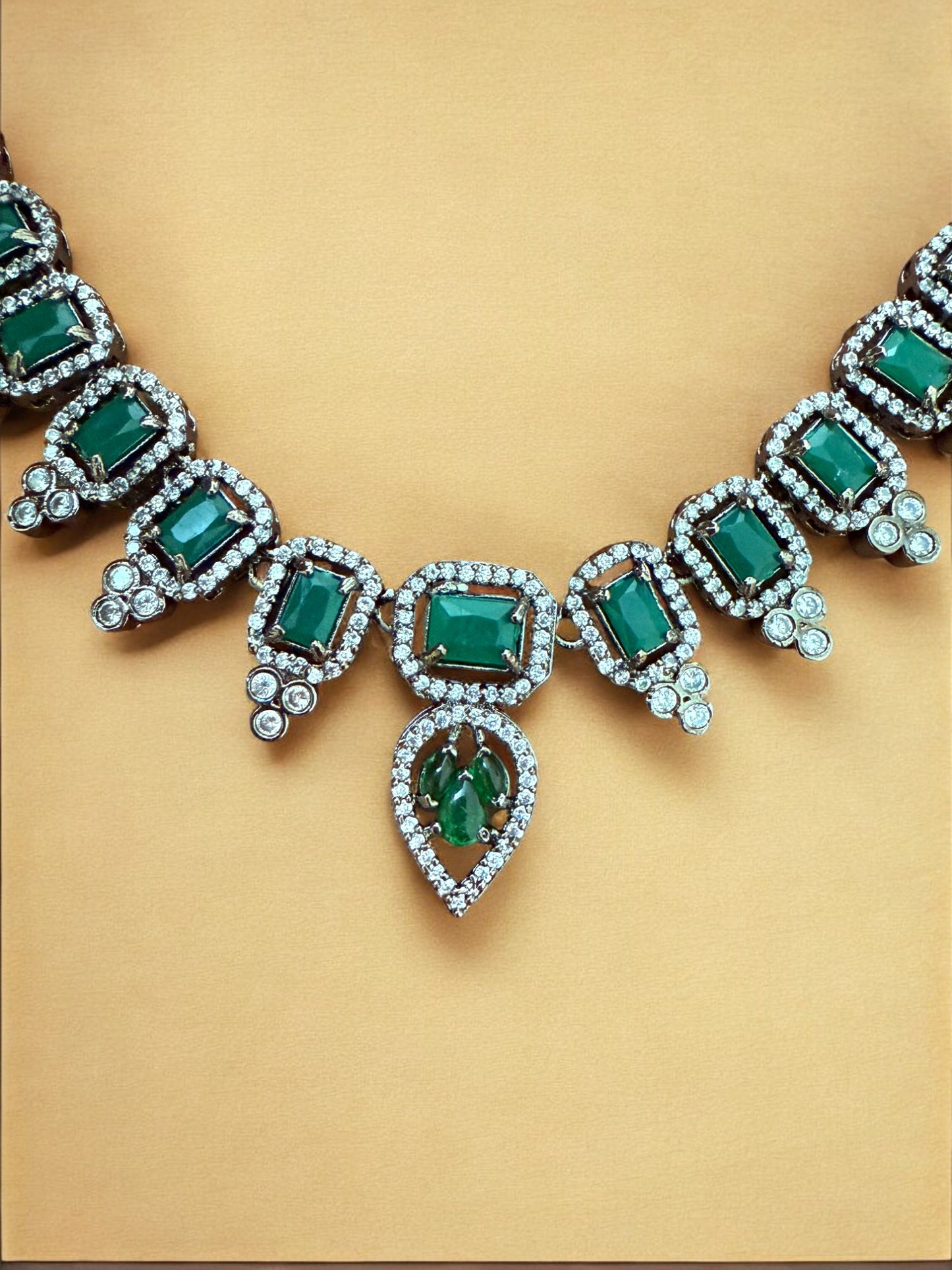 Emerald Green Necklace Set with Rectangular and Teardrop Stones Accented in Silver-Tone American Diamonds
