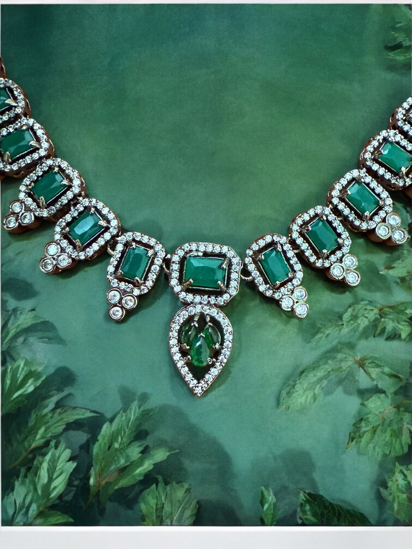 Emerald Green Necklace Set with Rectangular and Teardrop Stones Accented in Silver-Tone American Diamonds