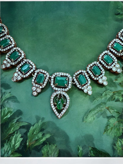 Emerald Green Necklace Set with Rectangular and Teardrop Stones Accented in Silver-Tone American Diamonds