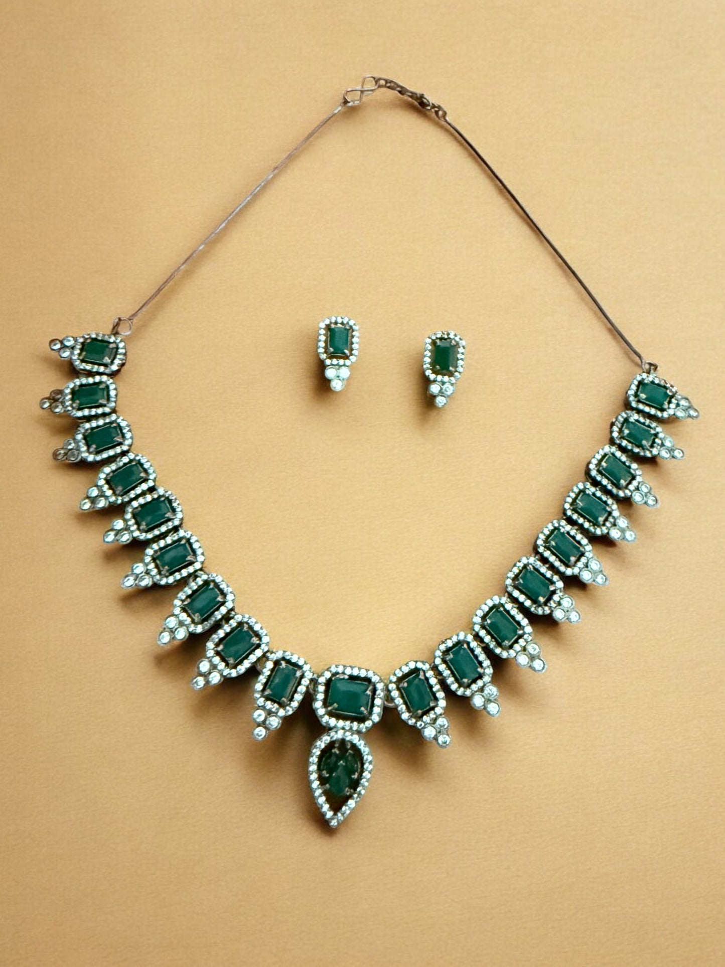 Emerald Green Necklace Set with Rectangular and Teardrop Stones Accented in Silver-Tone American Diamonds