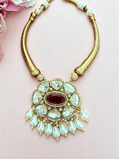 Regal Kundan Hasli Necklace Set with Ruby Red Centerpiece and Pearl Drop Accents