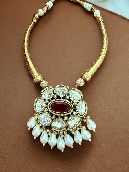 Regal Kundan Hasli Necklace Set with Ruby Red Centerpiece and Pearl Drop Accents