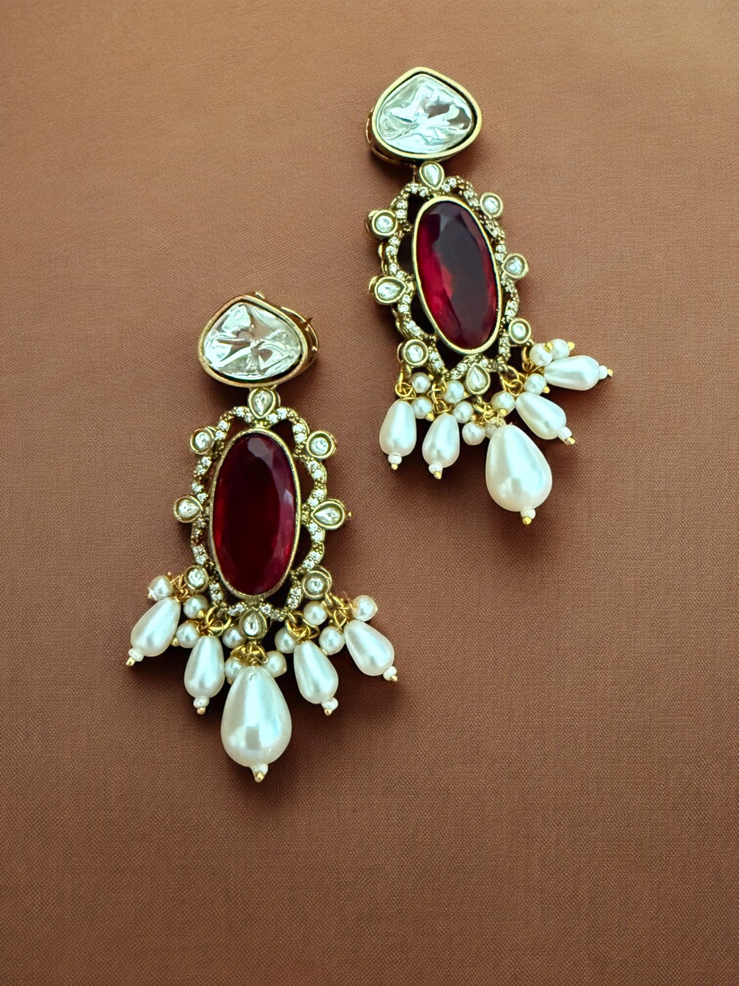 Regal Kundan Hasli Necklace Set with Ruby Red Centerpiece and Pearl Drop Accents