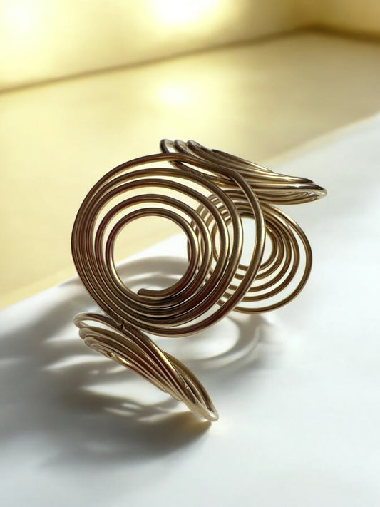 Bold Spiral Gold Cuff – A Statement of Modern Elegance