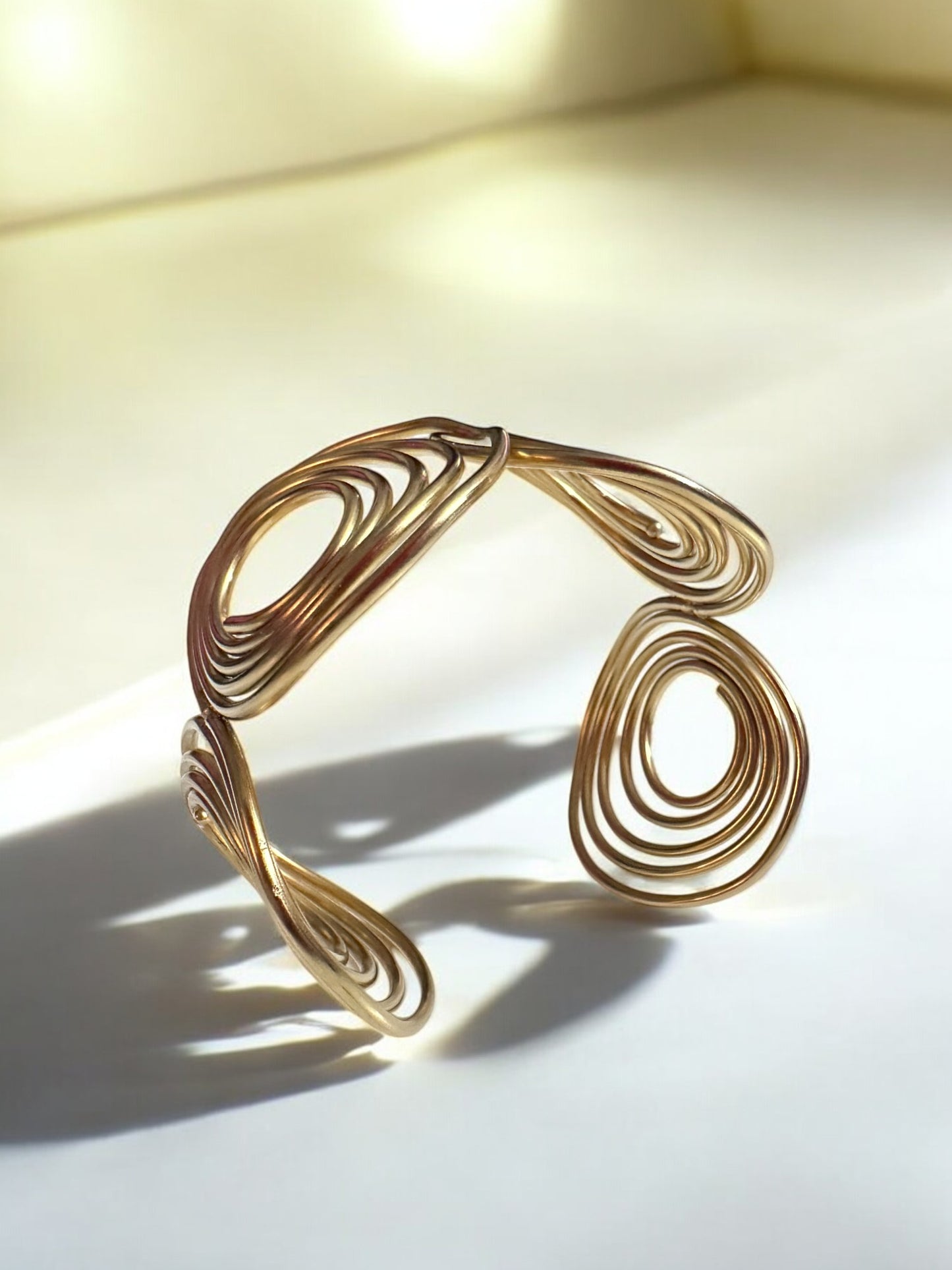 Bold Spiral Gold Cuff – A Statement of Modern Elegance