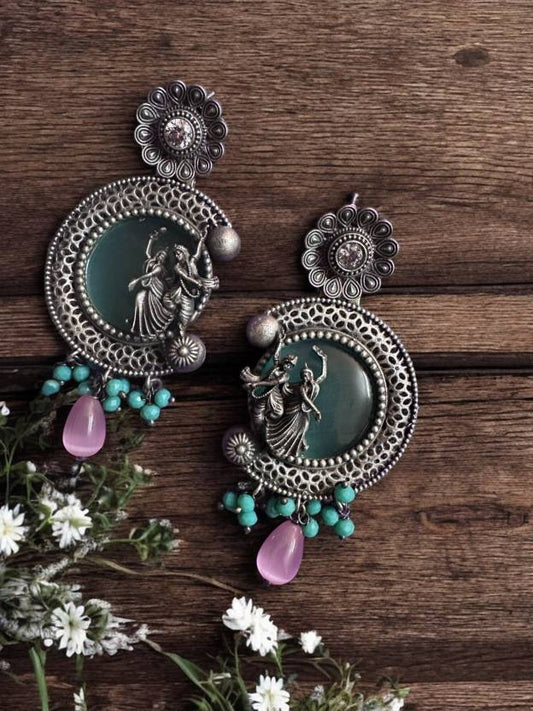 German Silver Pink Moon Stone Earring with Radhe Krishna Motif Alloy Drops & Danglers